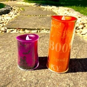 Halloween LED flickering illuminating pillar candles
Set of two